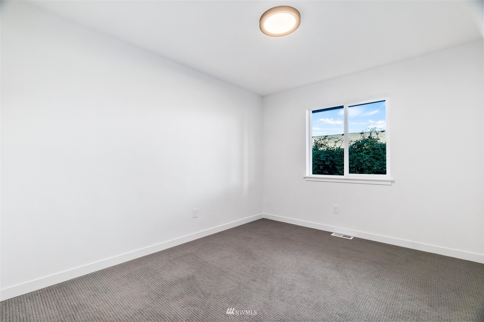 9815 178th Way Southwest Rochester, WA 98579 - Photo 24 of 35 an empty room with a window
