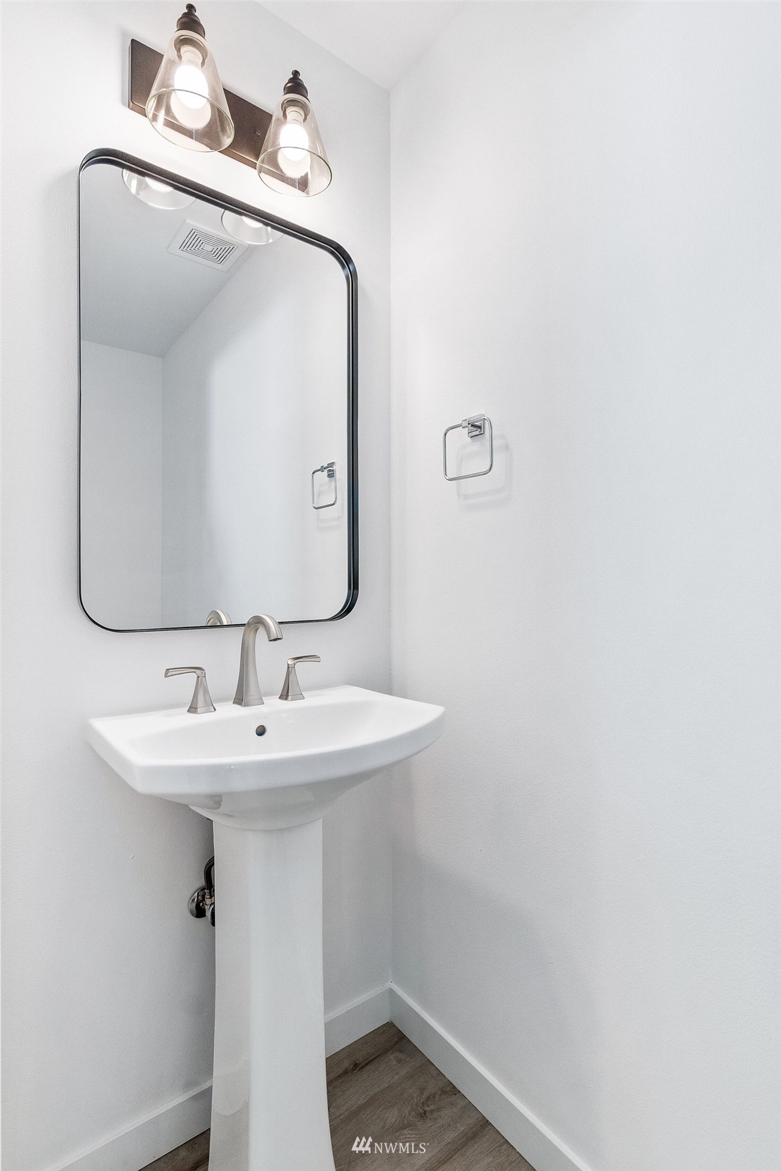 9815 178th Way Southwest Rochester, WA 98579 - Photo 28 of 35 a bathroom with a sink and a mirror