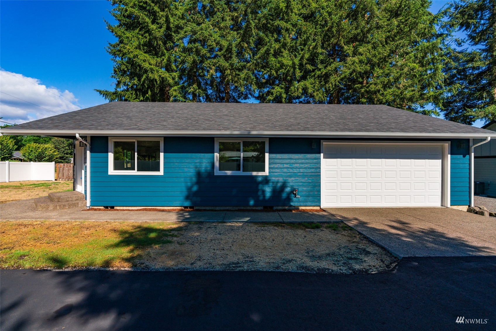 9815 178th Way Southwest Rochester, WA 98579 - Photo 35 of 35 a house view with a garden space