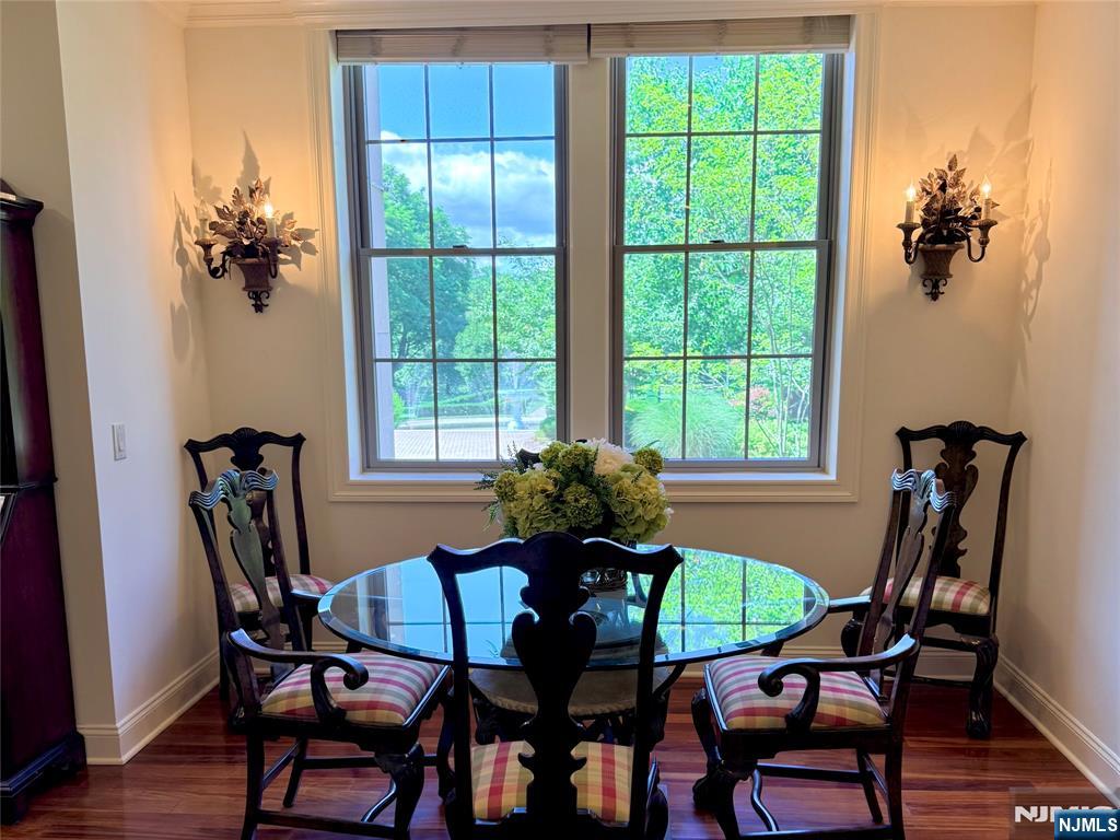 4201 Rio Vista Drive, Unit 4201 Mahwah, NJ 07430 - Photo 7 of 34 a view of a dining room with furniture and a window