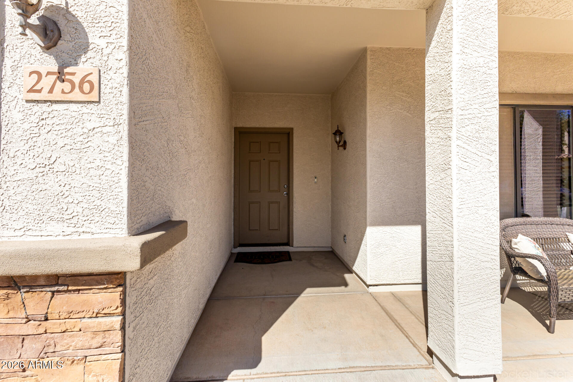 2756 South Powell Road Apache Junction, AZ 85119 - Photo 2 of 37 a view of a bedroom with wooden floor and furniture