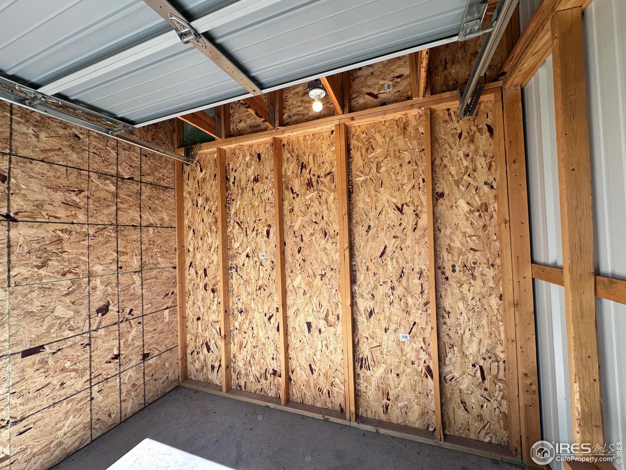 294 Howell Street Vona, CO 80861 - Photo 14 of 16 a view of walk in closet with wooden floor