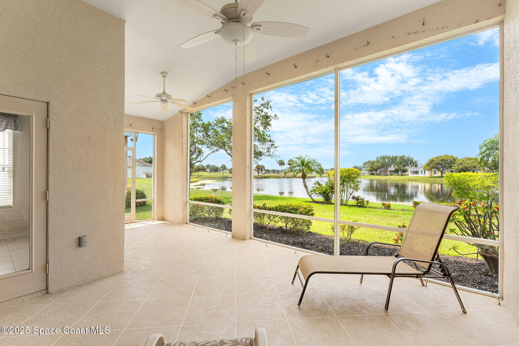 4882 Worthington Circle Rockledge, FL 32955 - Photo 23 of 41 Enjoy view of the lake and 7th hole!