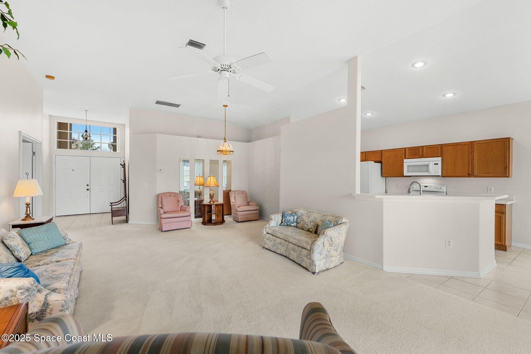 4882 Worthington Circle Rockledge, FL 32955 - Photo 5 of 41 Looking toward the front entry & kitchen