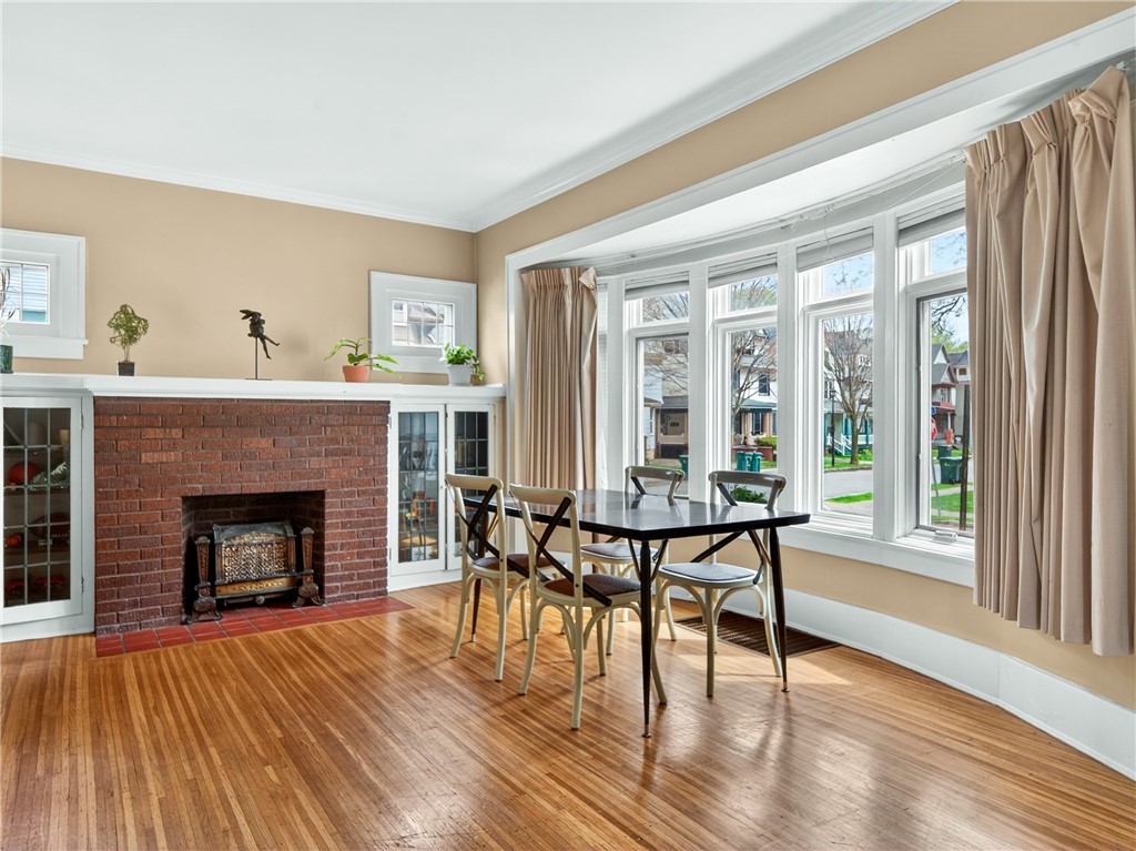 29 Harper Street Rochester, NY 14607 - Photo 23 of 46 Unit 69 Living room with Decorative Fireplace used