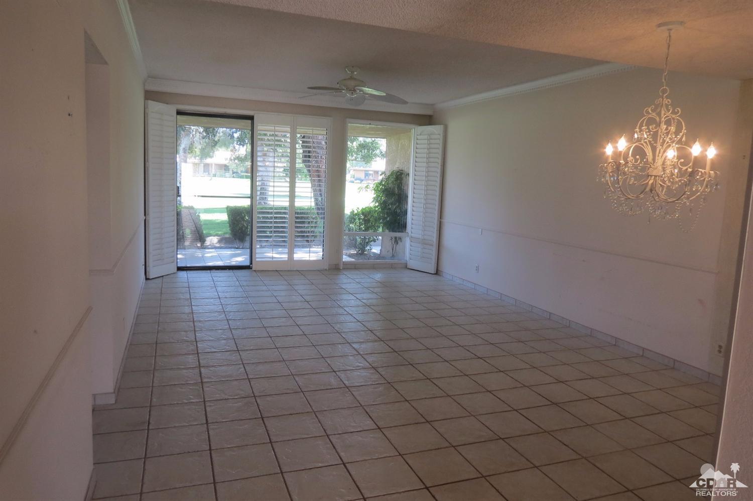 59 La Ronda Drive Rancho Mirage, CA 92270 - Photo 14 of 27 a view of an empty room and window