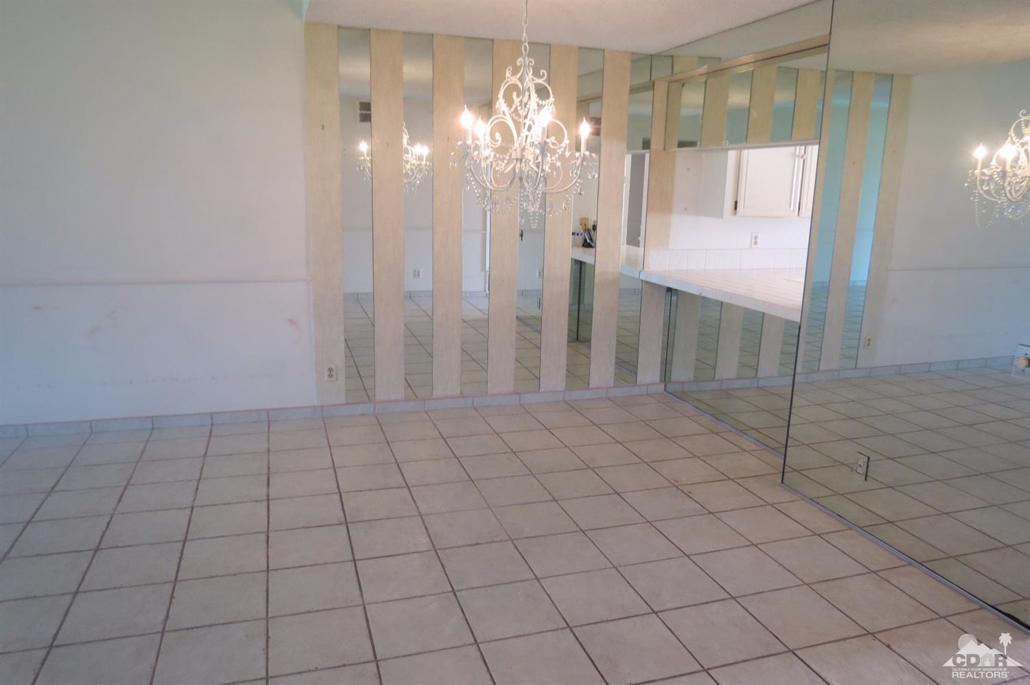 59 La Ronda Drive Rancho Mirage, CA 92270 - Photo 15 of 27 a bathroom with a shower