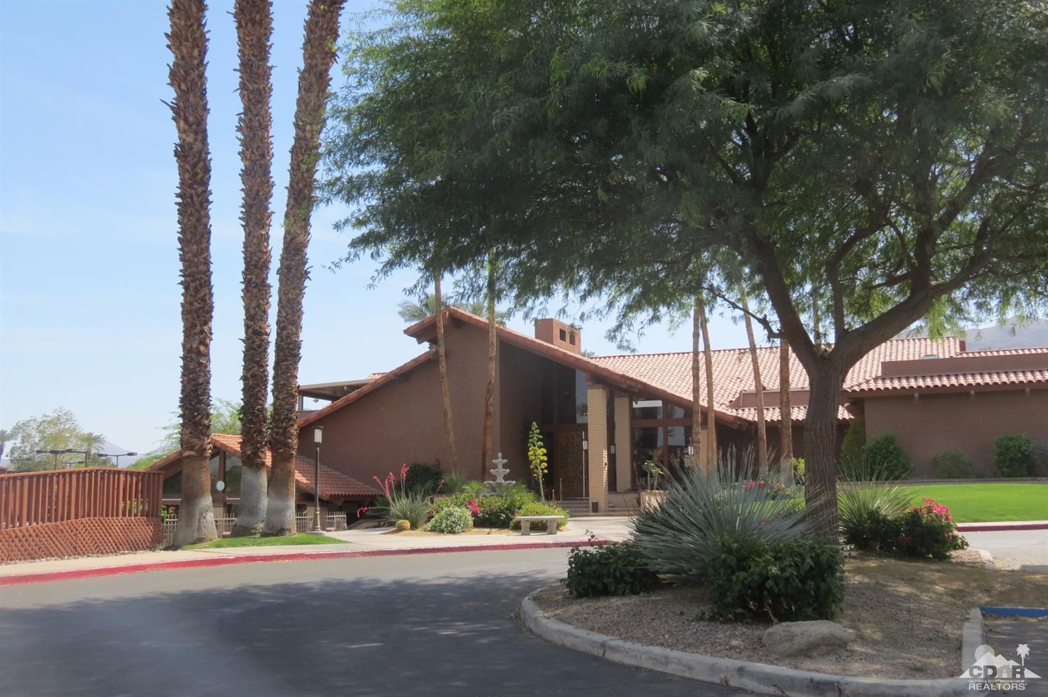 59 La Ronda Drive Rancho Mirage, CA 92270 - Photo 26 of 27 a view of a street with a building in the background