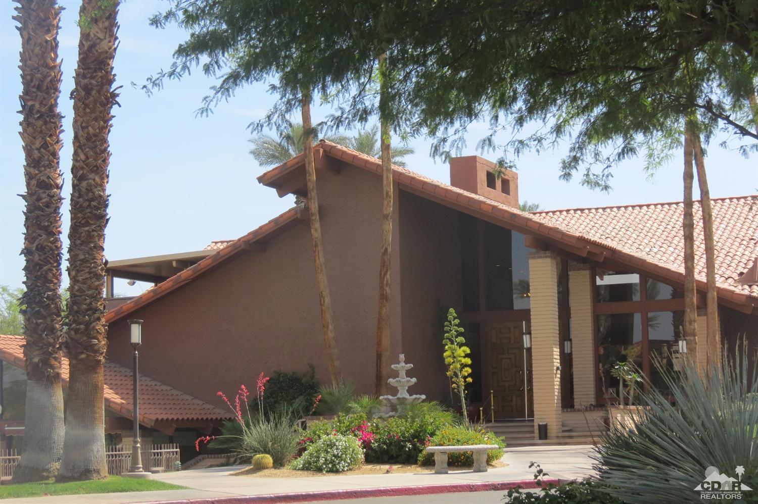 59 La Ronda Drive Rancho Mirage, CA 92270 - Photo 27 of 27 a couple of palm trees in front of a building