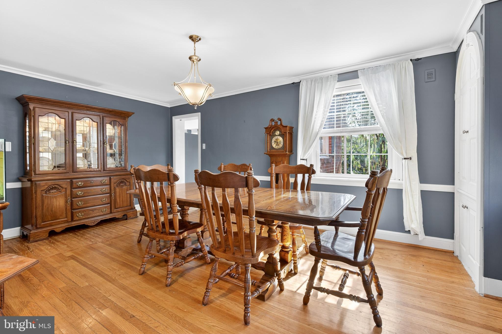 2315 Edgewood Road Harrisburg, PA 17104 - Photo 12 of 41 a dining room with furniture a chandelier and wooden floor