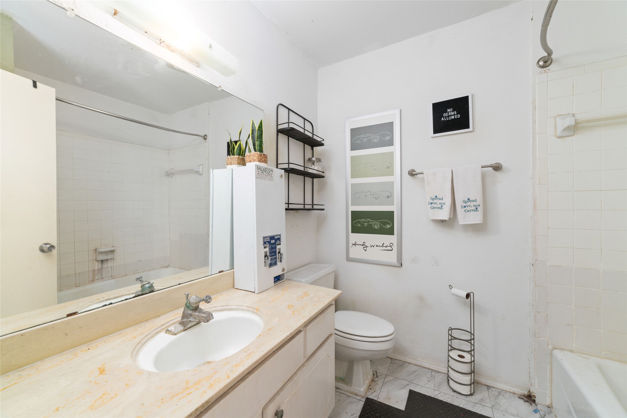 5800 Lumberdale Road, Unit 55 Houston, TX 77092 - Photo 22 of 34 a bathroom with a sink toilet and shower