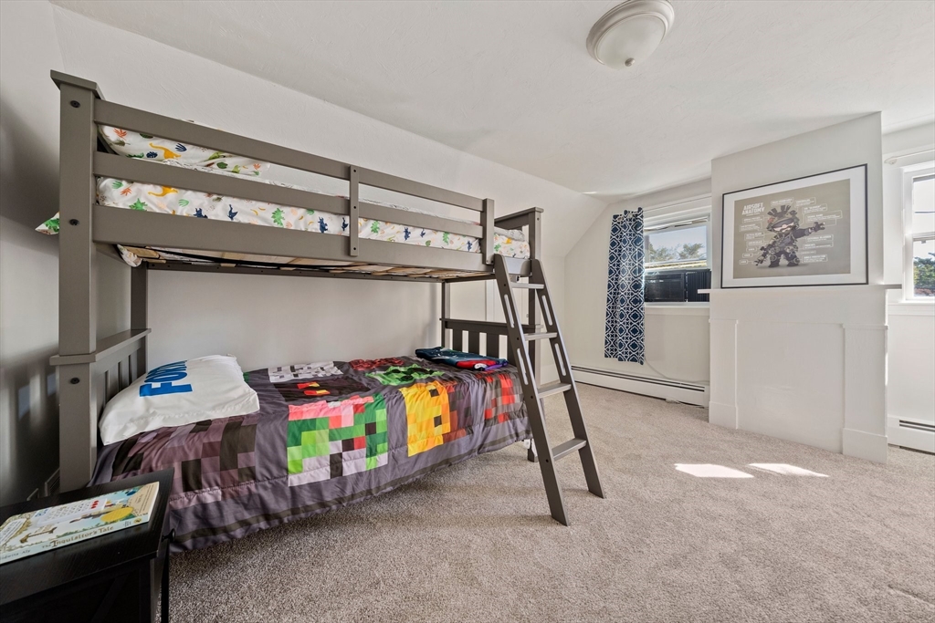 86 High Street Randolph, MA 02368 - Photo 14 of 28 a children room with toys