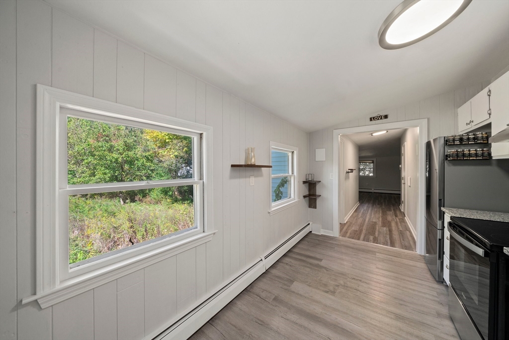 86 High Street Randolph, MA 02368 - Photo 20 of 28 a view of kitchen and wooden floor