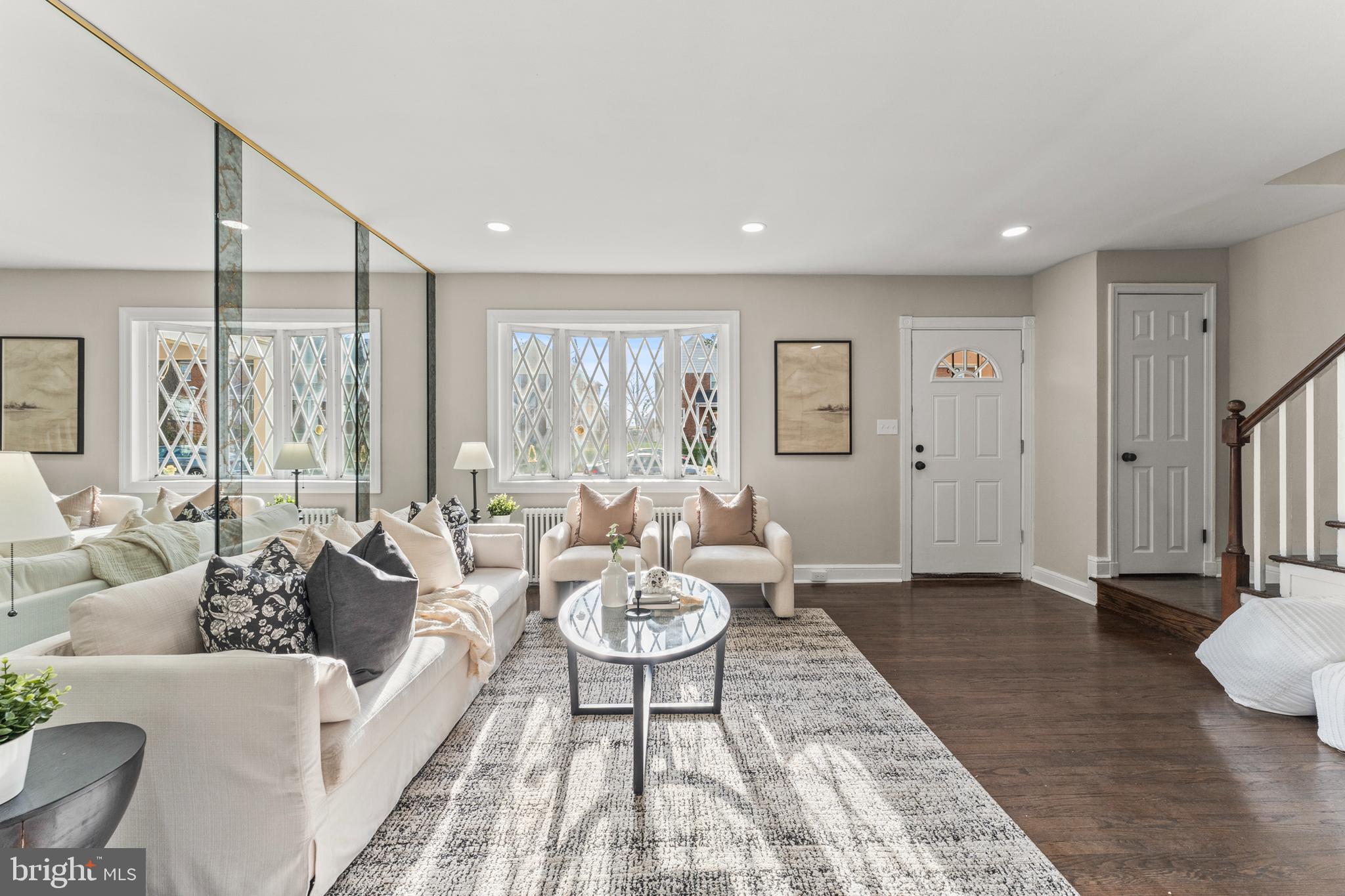 1324 Crofton Road Baltimore, MD 21239 - Photo 6 of 24 a living room with furniture and a large window
