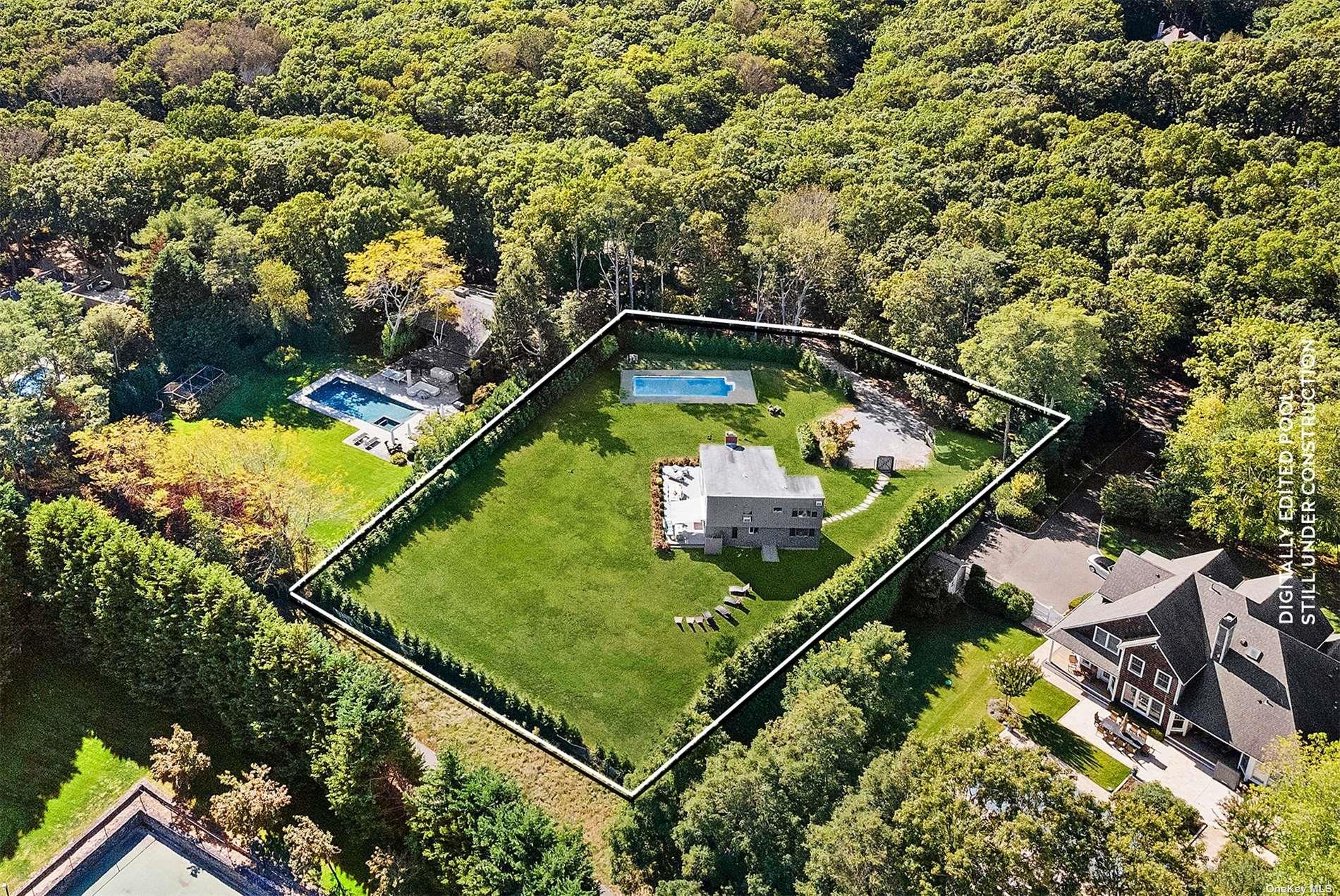 700 Edge Of Woods Road Southampton, NY 11976 - Photo 2 of 4 a view of a back yard