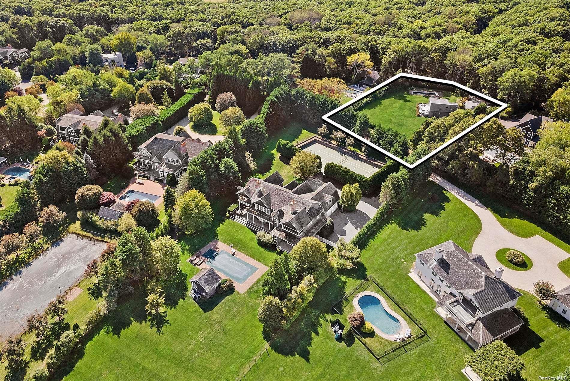 700 Edge Of Woods Road Southampton, NY 11976 - Photo 4 of 4 an aerial view of residential house with outdoor space and swimming pool