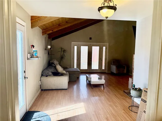 a kitchen with a sink a stove and cabinets