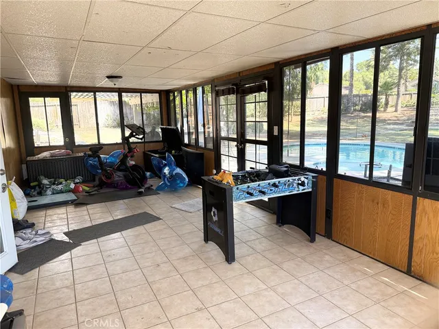 a view of a yard with large trees