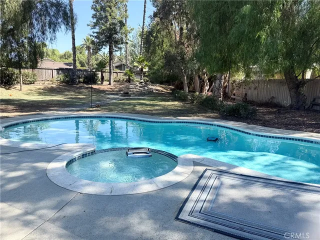 a view of a yard with tree s