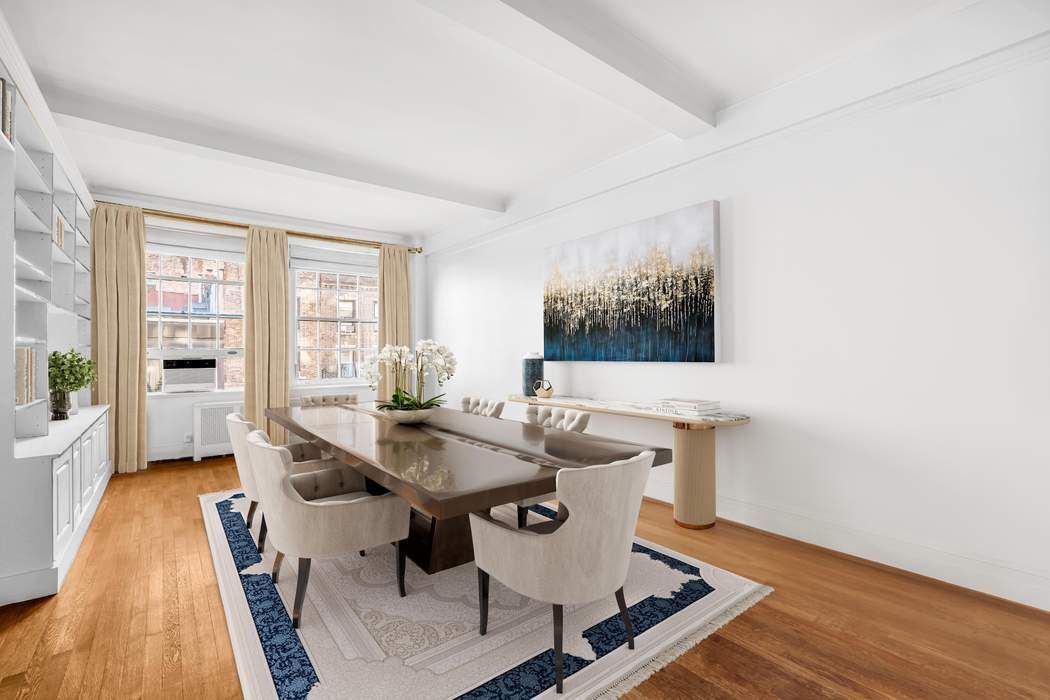130 East 75th Street, Unit 3B Manhattan, NY 10021 - Photo 4 of 15 a dining room with furniture and wooden floor