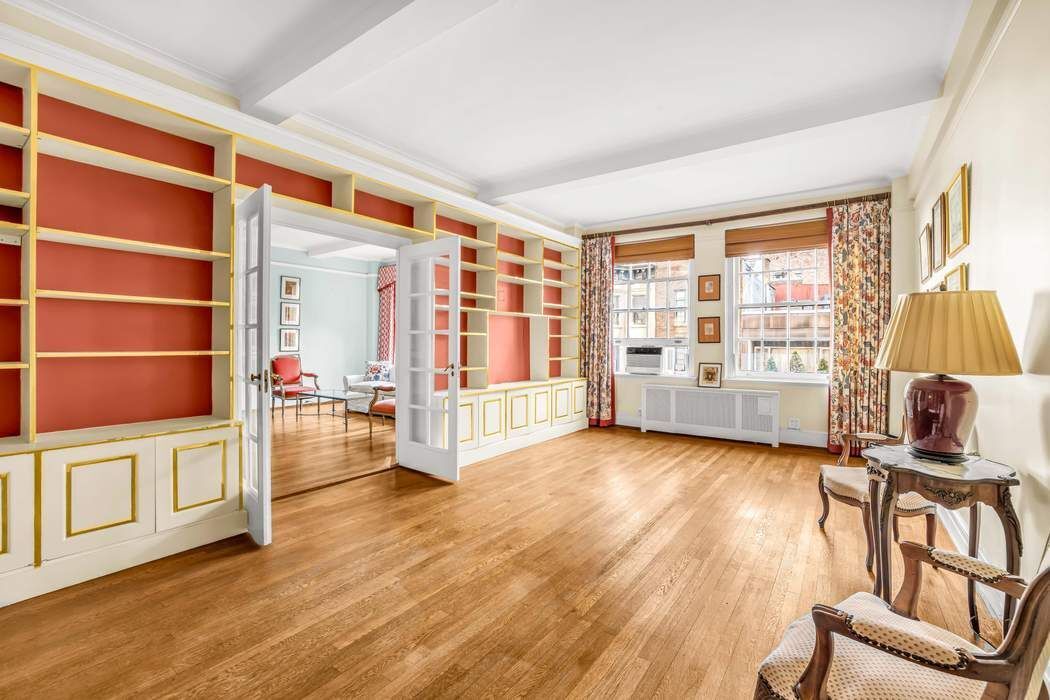 130 East 75th Street, Unit 3B Manhattan, NY 10021 - Photo 6 of 15 wooden floor in an empty room with a window
