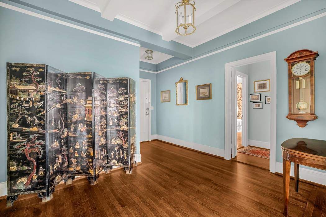 130 East 75th Street, Unit 3B Manhattan, NY 10021 - Photo 9 of 15 a view of livingroom with window and hardwood floor