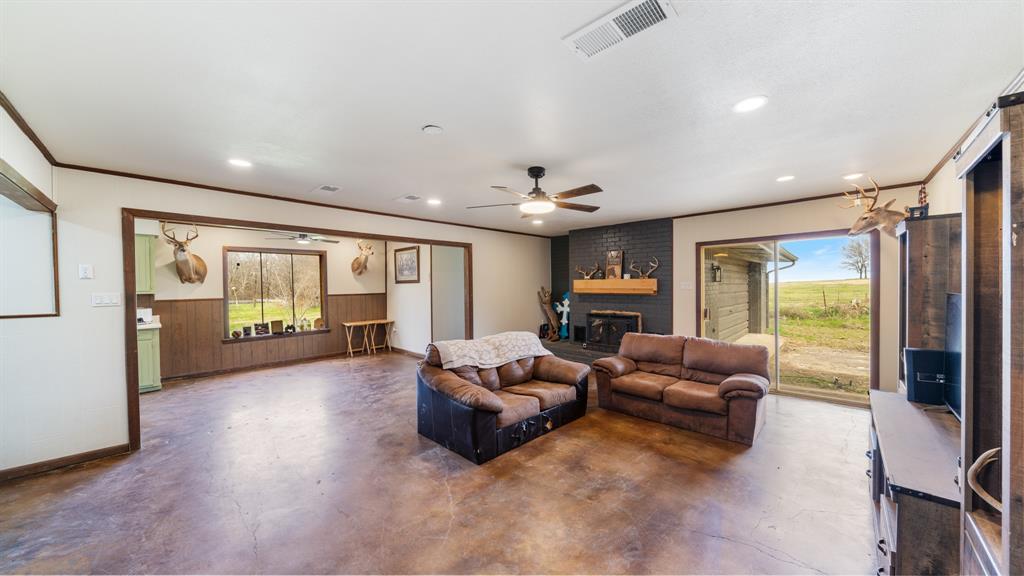 1123 Tbd County Road Fruitvale, TX 75127 - Photo 11 of 31 a living room with furniture and a large window