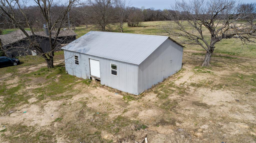 1123 Tbd County Road Fruitvale, TX 75127 - Photo 23 of 31 a view of a dry yard with wooden fence
