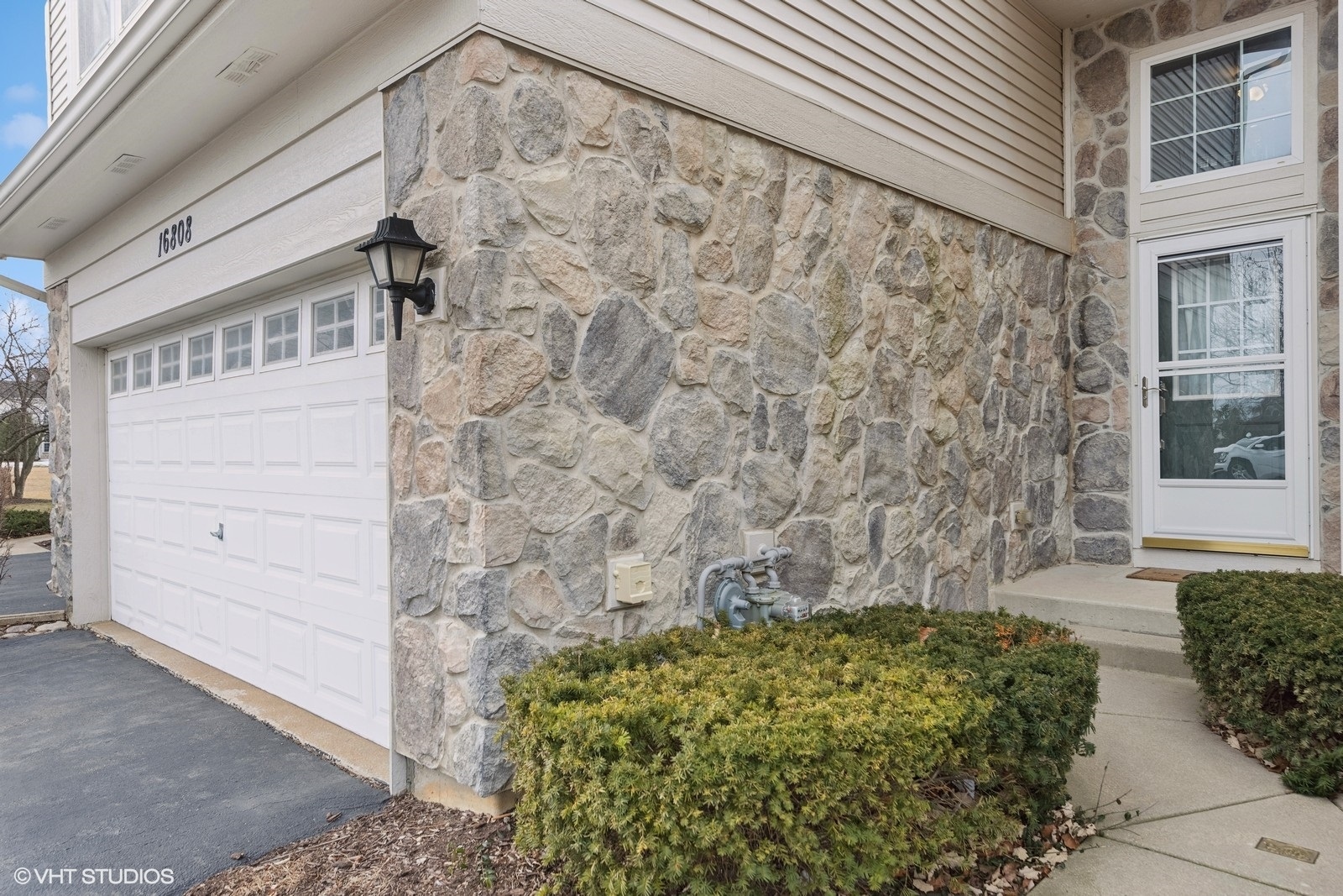 16808 Locust Lane Lockport, IL 60441 - Photo 2 of 20 a view of a pathway of the house