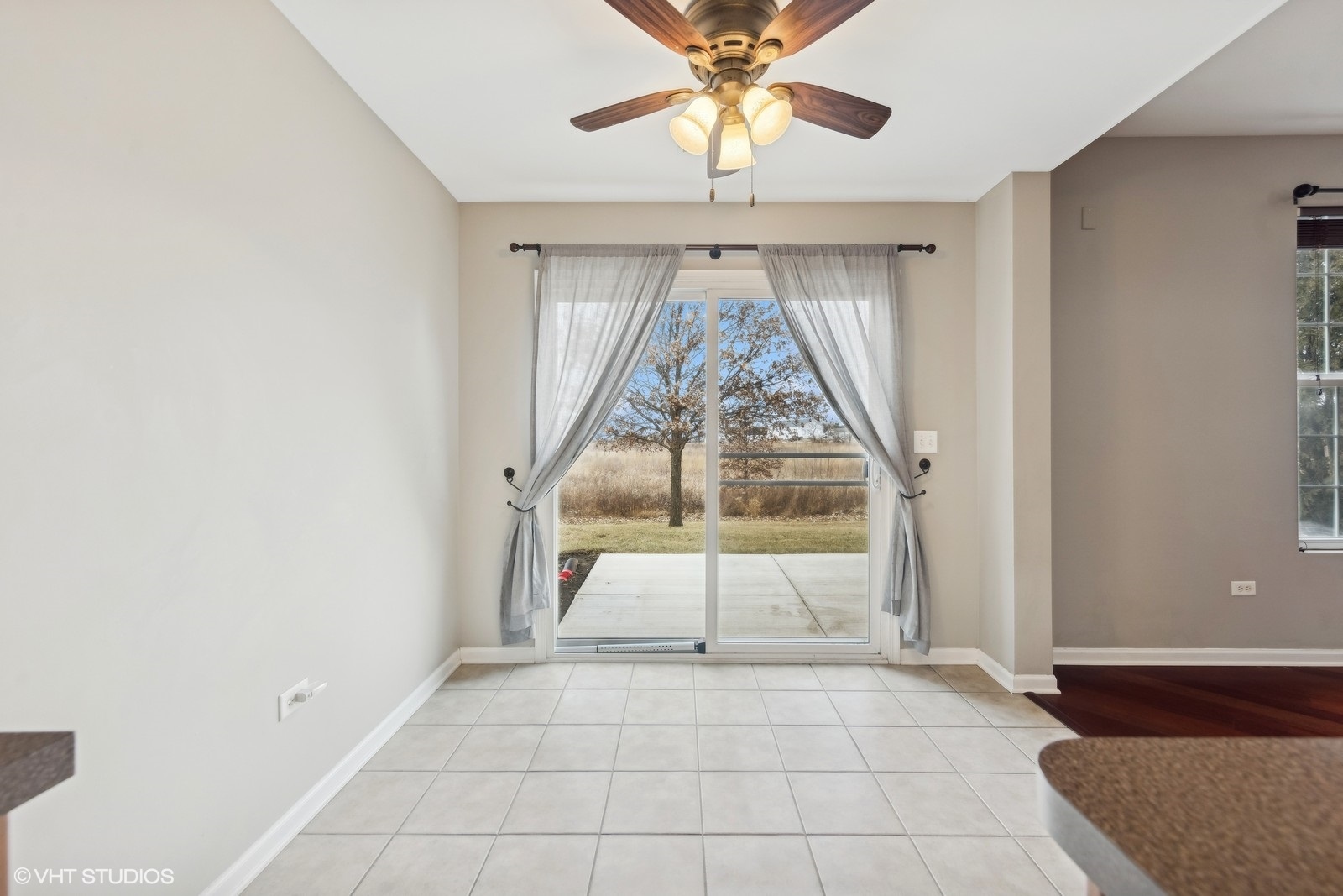 16808 Locust Lane Lockport, IL 60441 - Photo 7 of 20 wooden floor in an empty room with a window