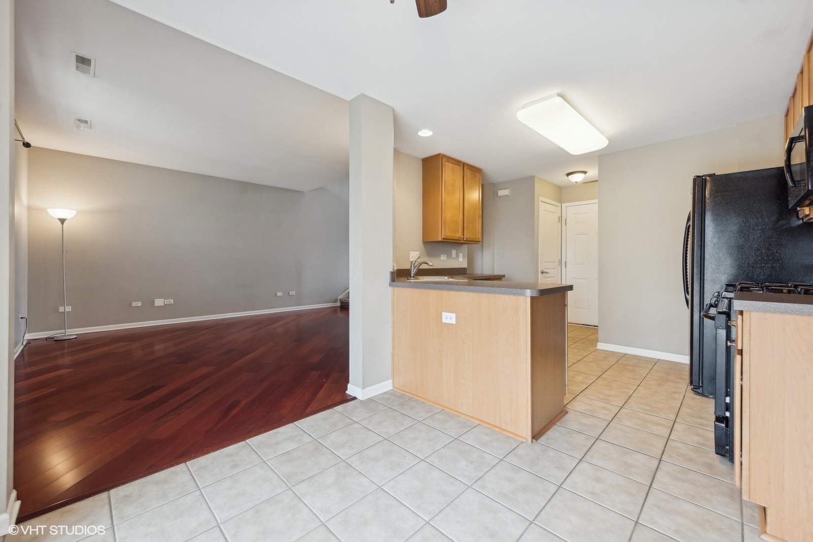 16808 Locust Lane Lockport, IL 60441 - Photo 8 of 20 a view of kitchen with cabinets and wooden floor