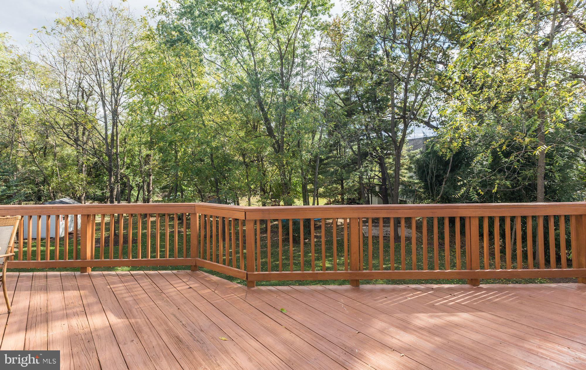 18815 Severn Road Gaithersburg, MD 20879 - Photo 11 of 38 Deck overlooks tranquil partially wooded backyard