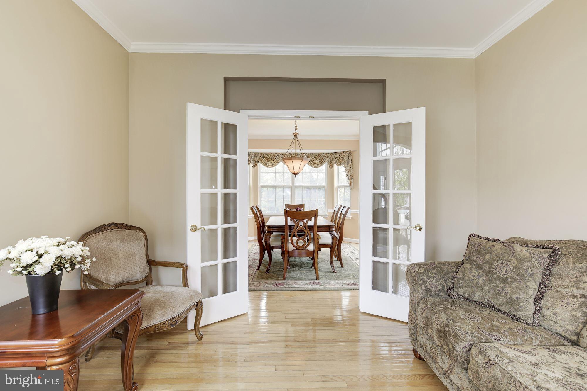 18815 Severn Road Gaithersburg, MD 20879 - Photo 14 of 38 Formal living room, French doors open to dining rm