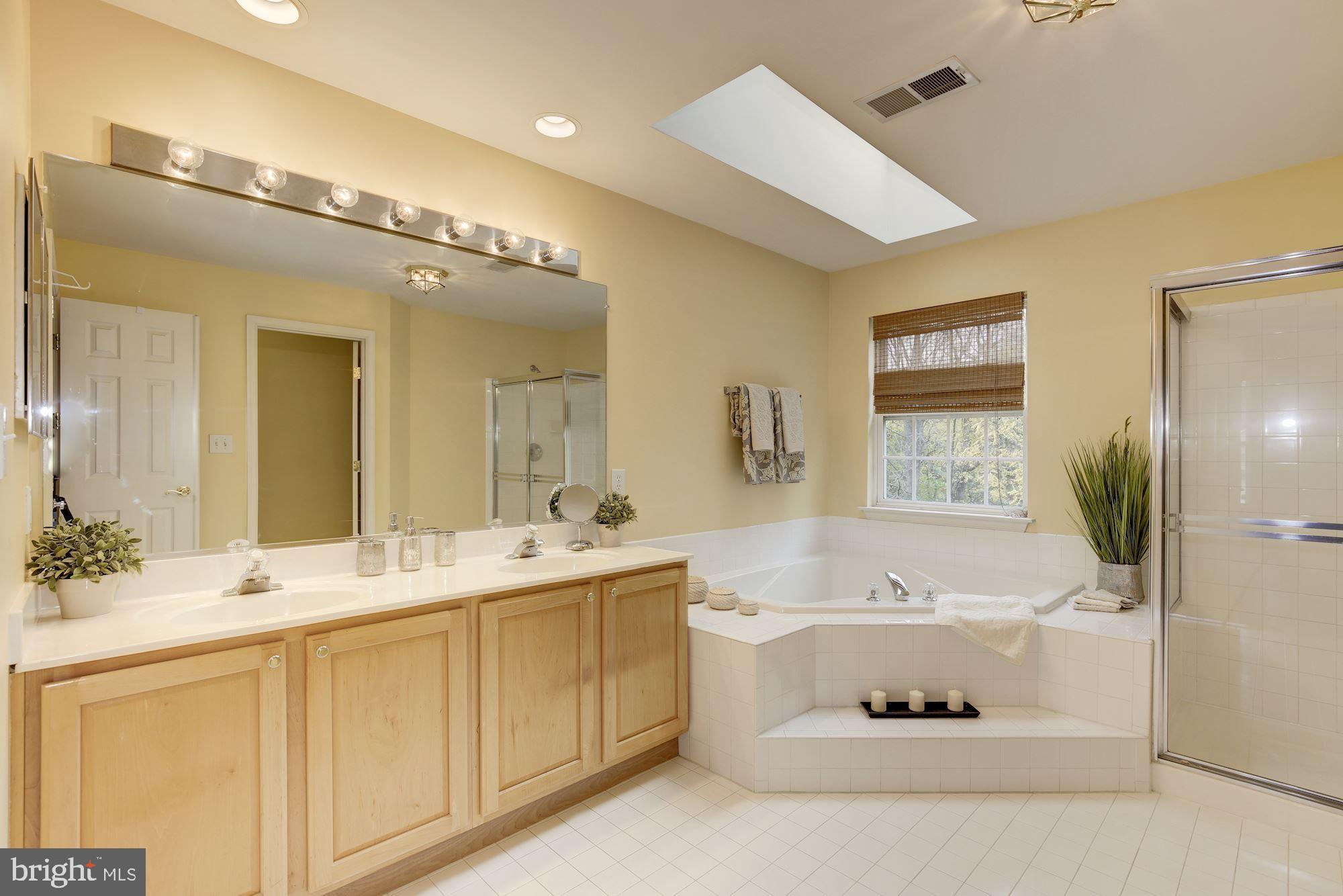 18815 Severn Road Gaithersburg, MD 20879 - Photo 25 of 38 Spa-like Master bath with sky light & recess light