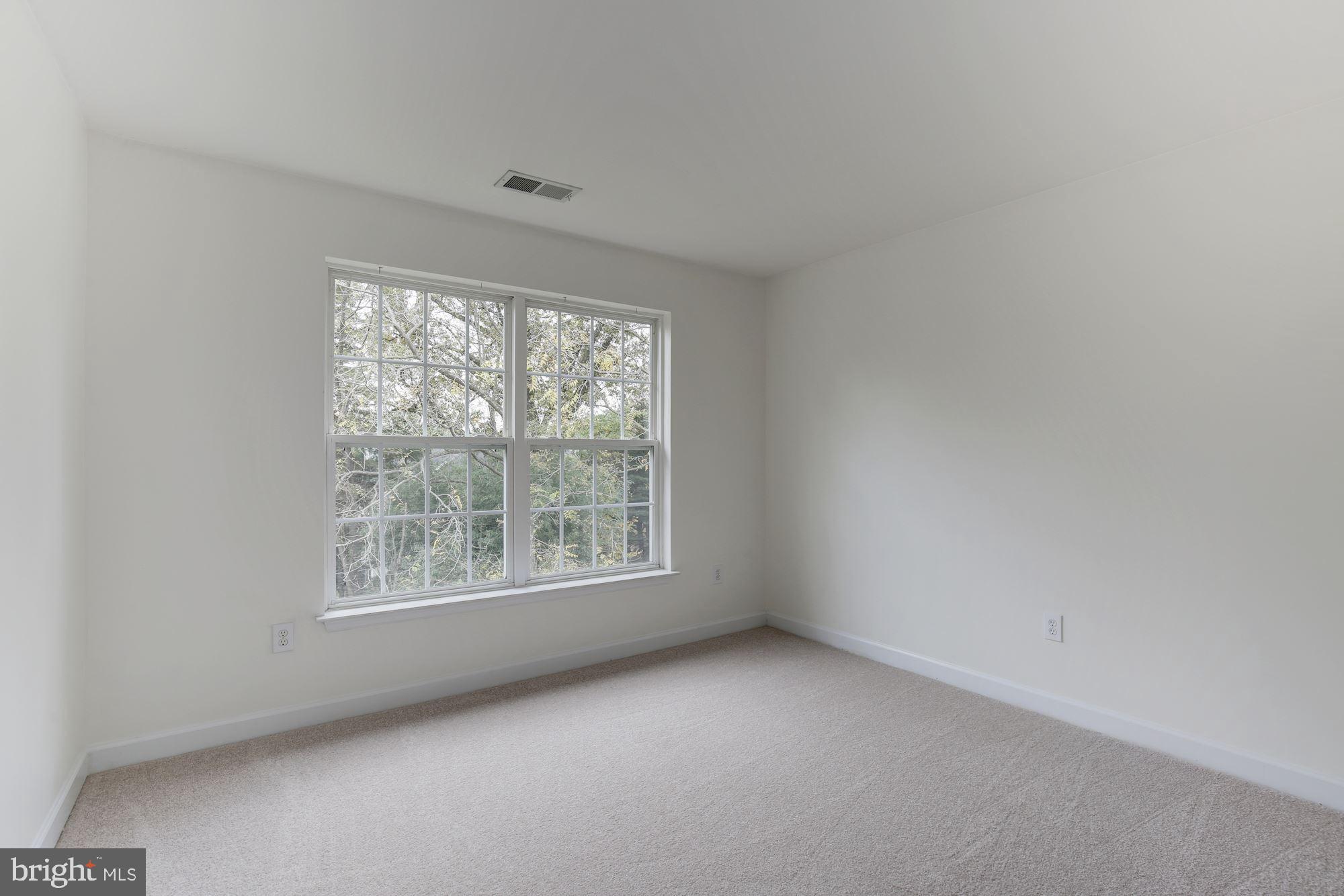18815 Severn Road Gaithersburg, MD 20879 - Photo 27 of 38 Sun light filled bedroom, carpeted, large window