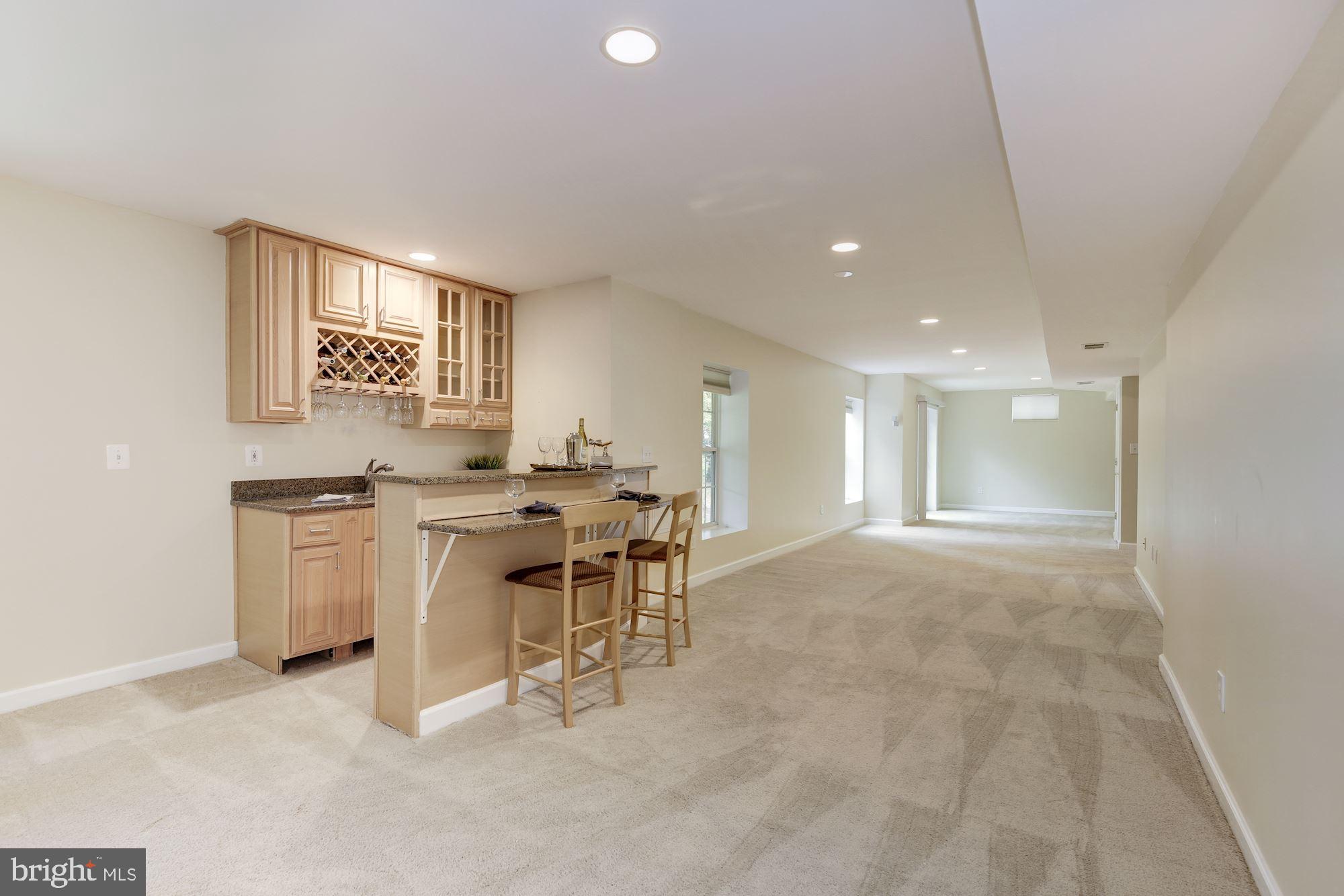 18815 Severn Road Gaithersburg, MD 20879 - Photo 28 of 38 Wet bar in lower level for entertainment