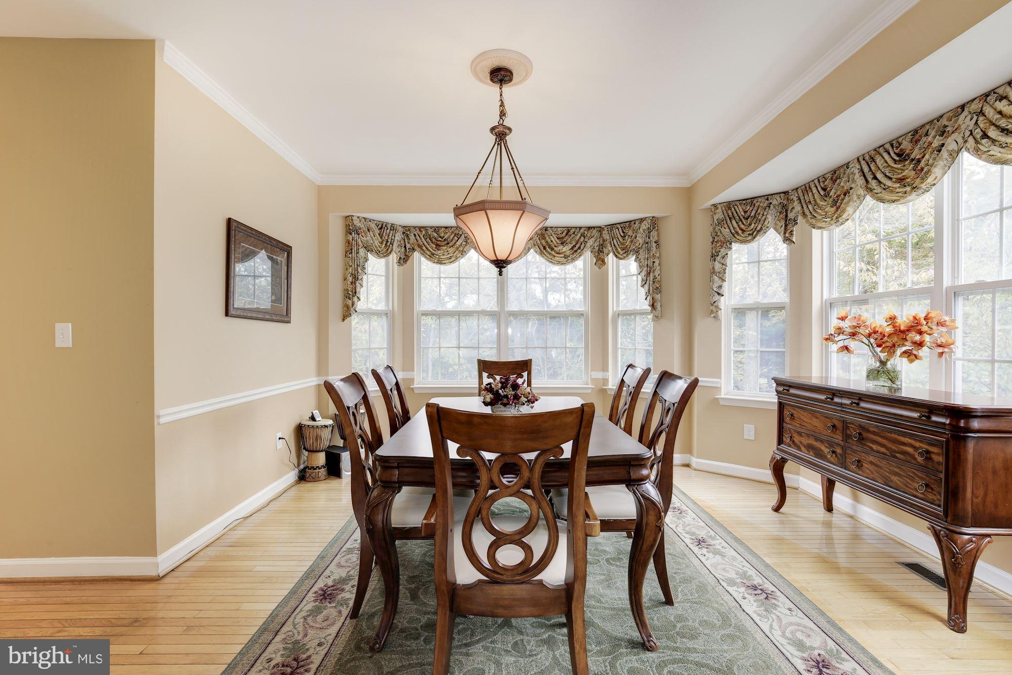 18815 Severn Road Gaithersburg, MD 20879 - Photo 4 of 38 Formal dining room, wood floors, BOSE speakers