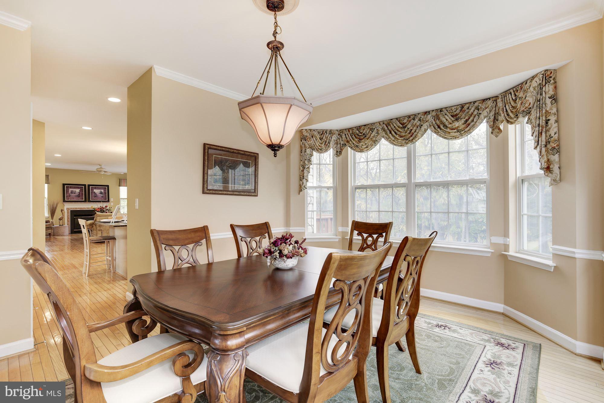 18815 Severn Road Gaithersburg, MD 20879 - Photo 5 of 38 Wall to wall windows allow plentiful natural light