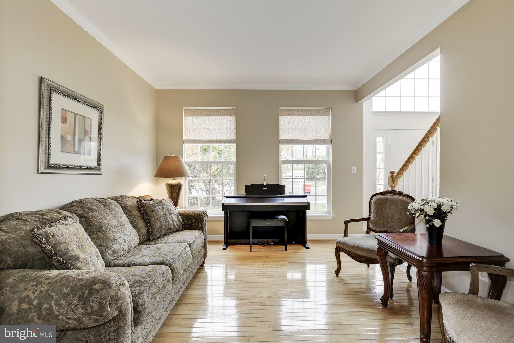 18815 Severn Road Gaithersburg, MD 20879 - Photo 7 of 38 Formal living room, large windows, wood floors