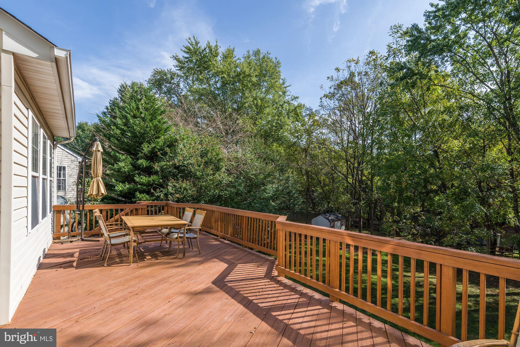 18815 Severn Road Gaithersburg, MD 20879 - Photo 9 of 38 Large wood deck offers outdoor living