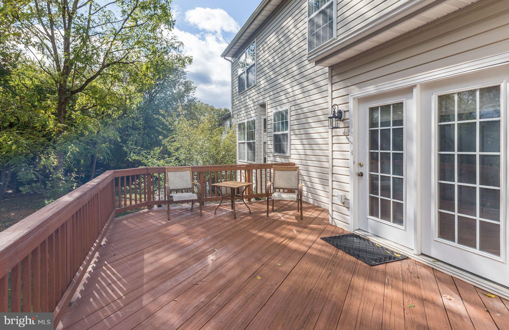 18815 Severn Road Gaithersburg, MD 20879 - Photo 10 of 38 Wood deck runs along the house
