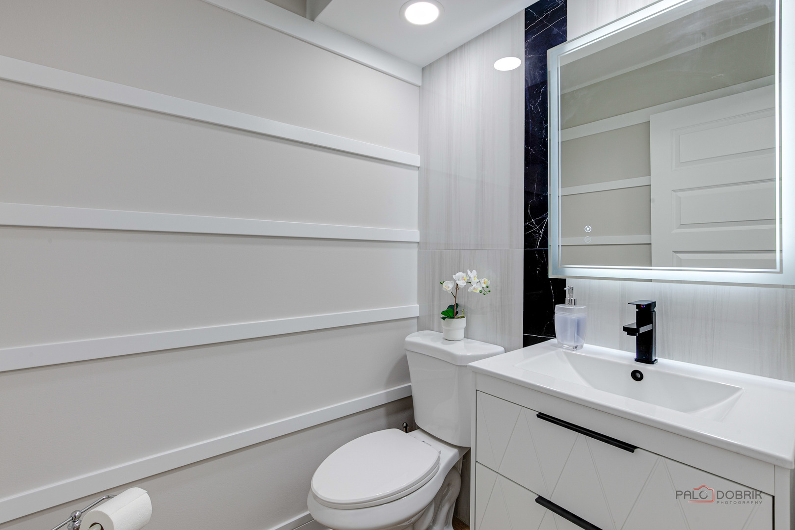 5190 Chambers Drive Hoffman Estates, IL 60010 - Photo 14 of 23 a bathroom with a sink a toilet and shower