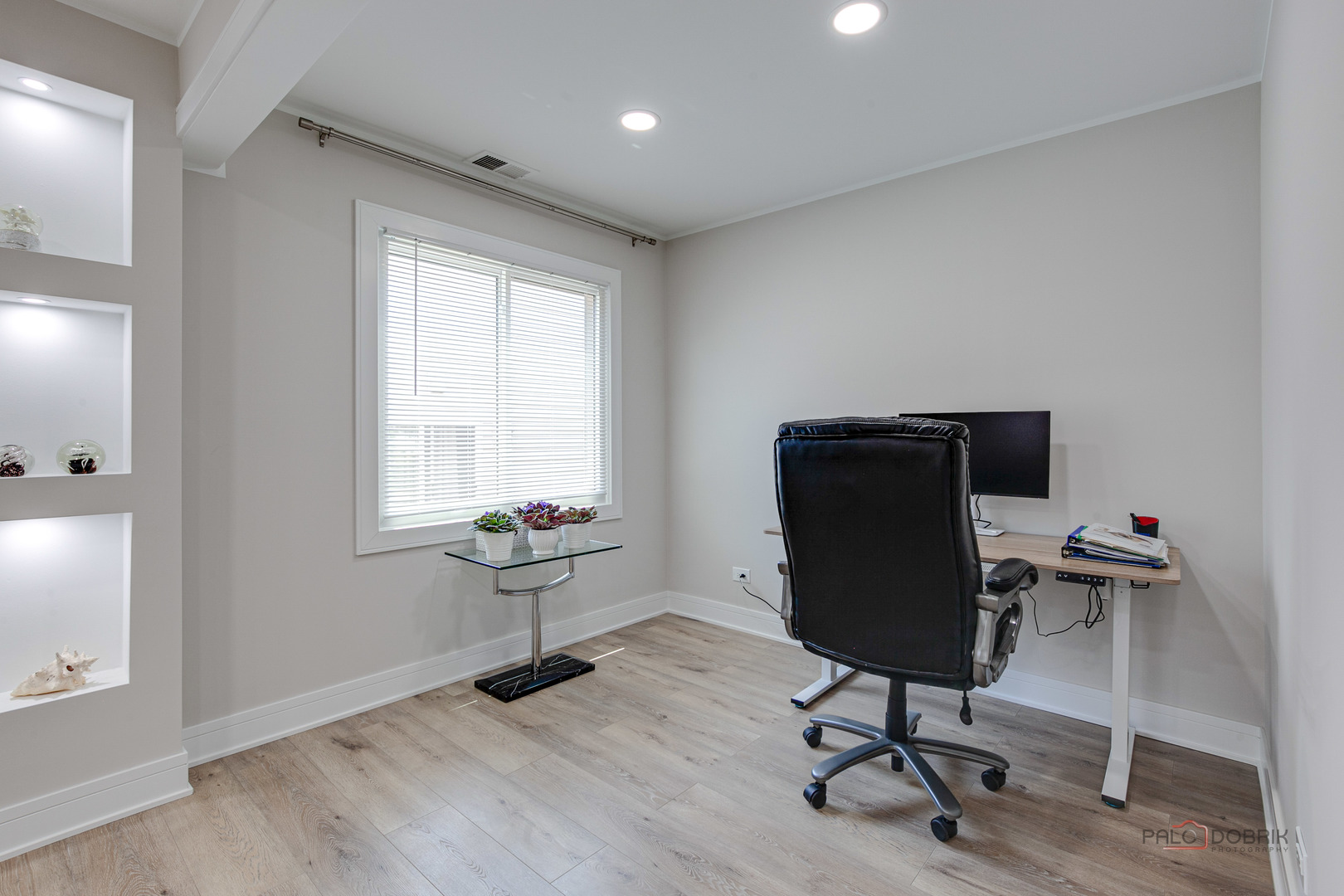 5190 Chambers Drive Hoffman Estates, IL 60010 - Photo 15 of 23 a view of a workspace with furniture and a window