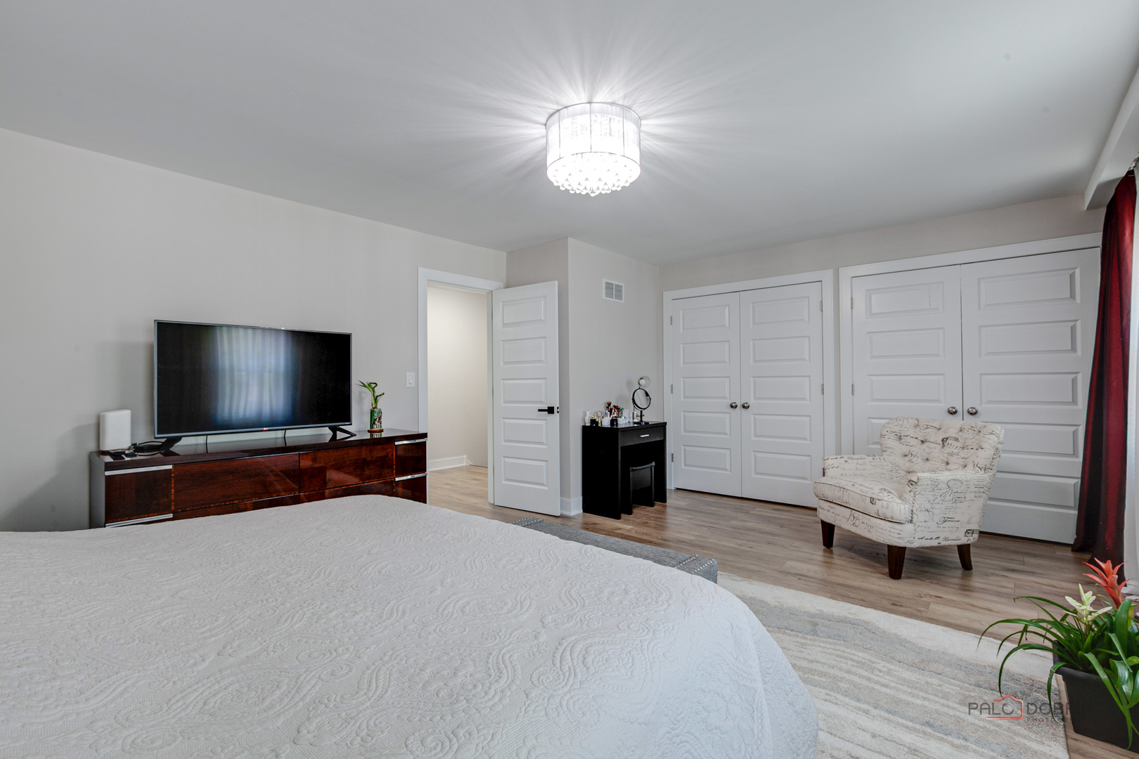 5190 Chambers Drive Hoffman Estates, IL 60010 - Photo 17 of 23 a bedroom with bed and a flat screen tv