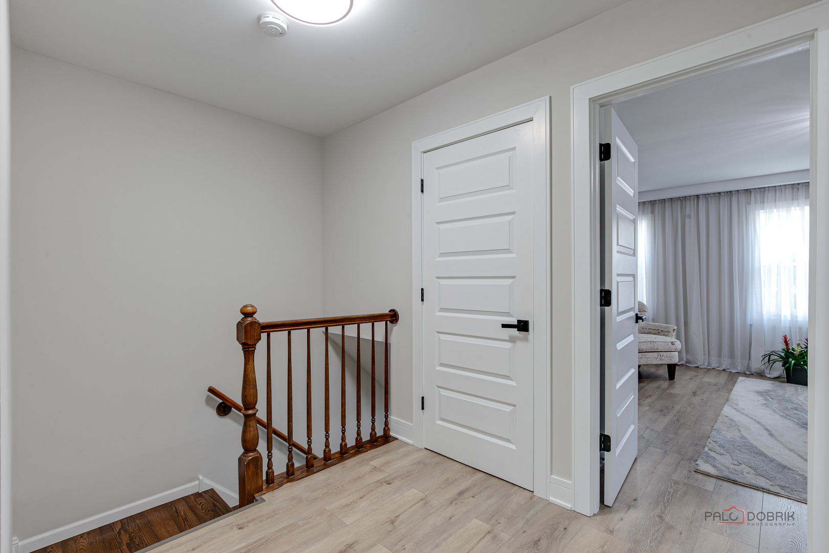 5190 Chambers Drive Hoffman Estates, IL 60010 - Photo 19 of 23 a view of a hallway to rooms and stairs