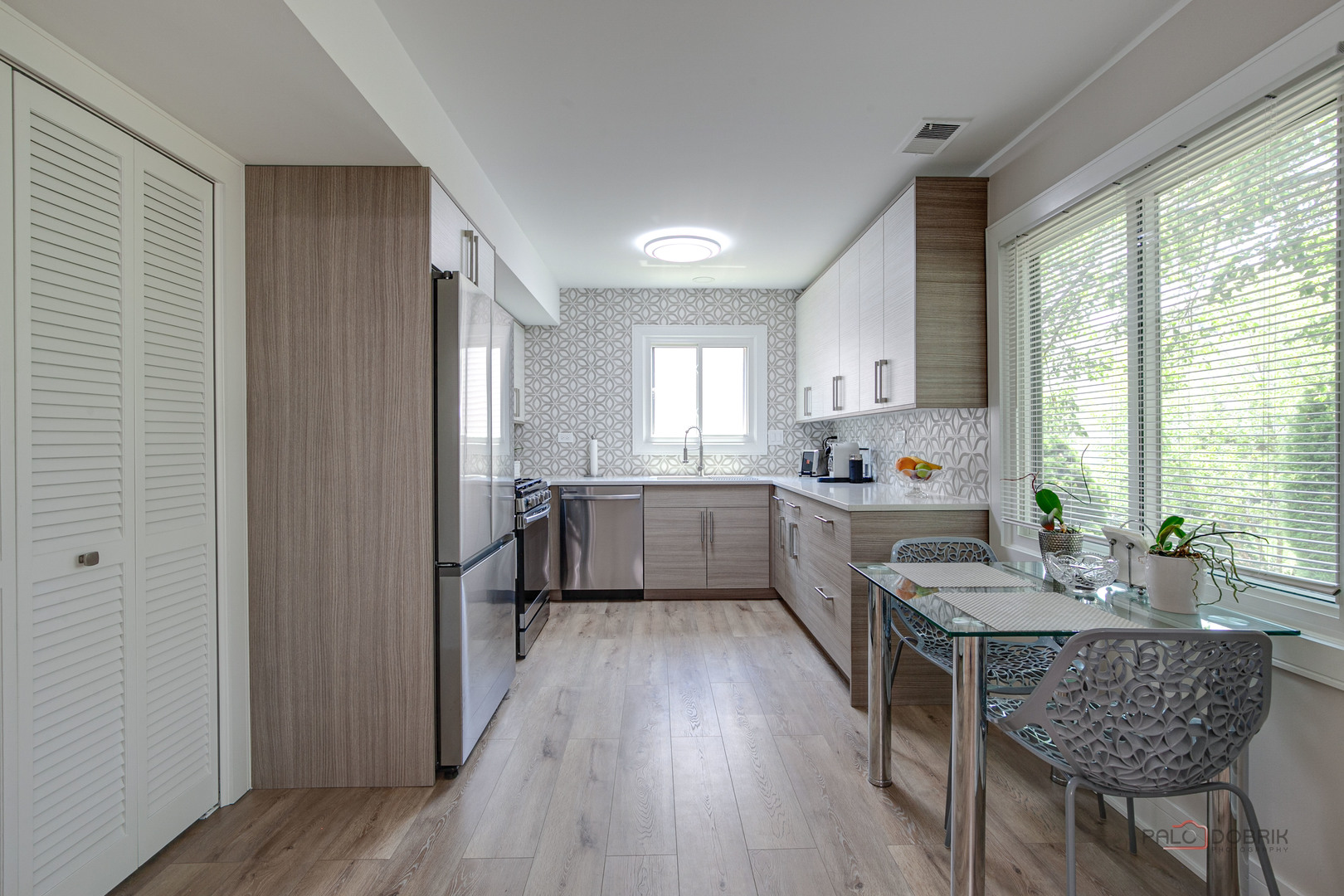 5190 Chambers Drive Hoffman Estates, IL 60010 - Photo 10 of 23 a kitchen with granite countertop lots of counter top space and wooden floor