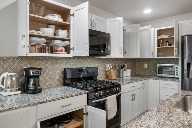 a living room filled with furniture