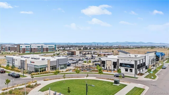 an aerial view of a city with swimming pool