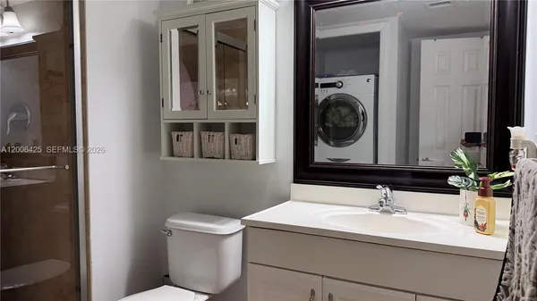 a bathroom with a sink and a toilet