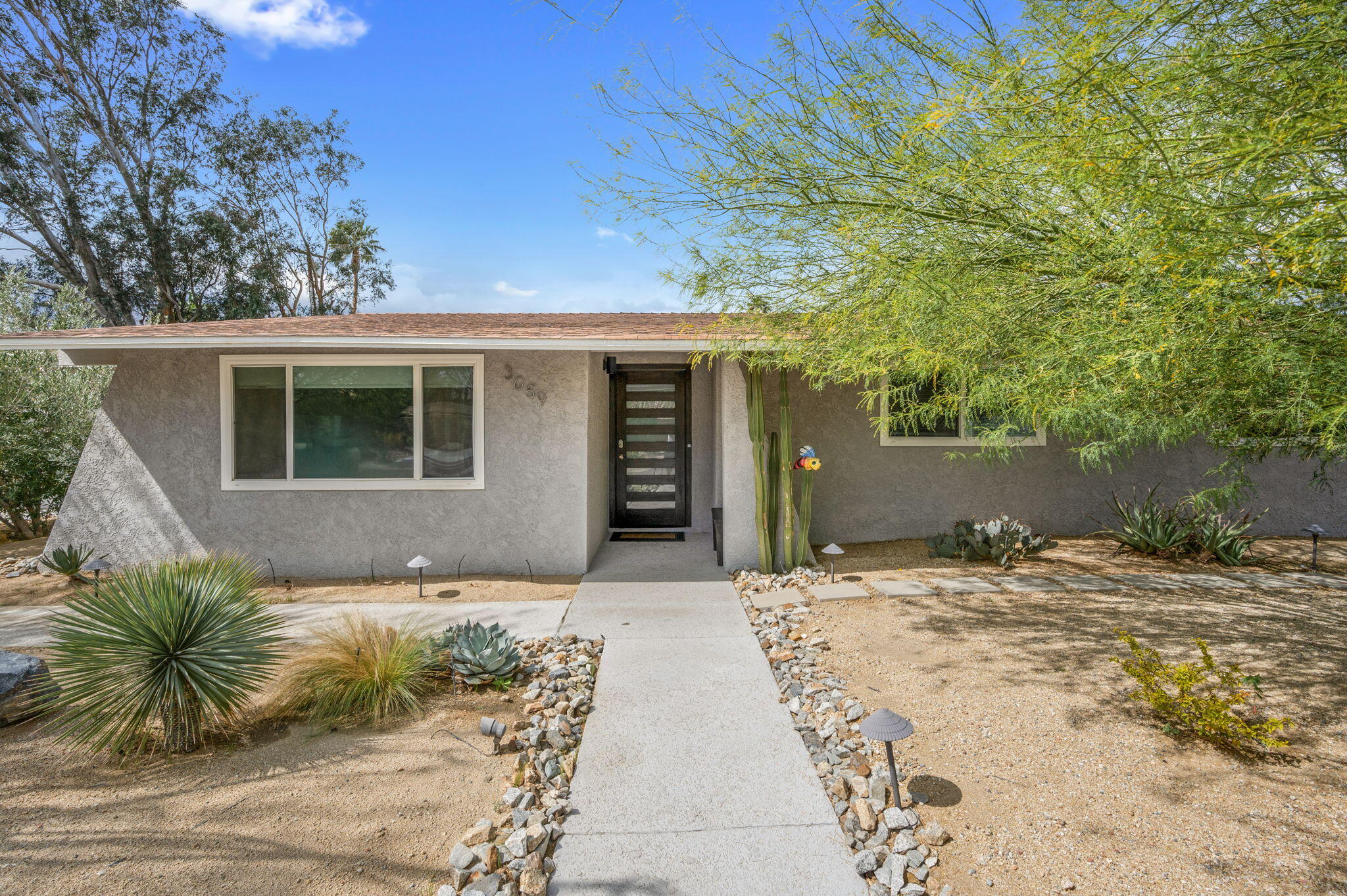 a view of backyard of a house